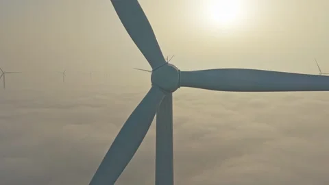 Offshore wind turbine farm generating clean renewable energy 動画素材 330421203