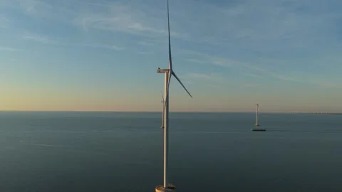 Offshore wind turbines generating clean renewable energy Stock-Footage 333648751