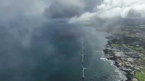 Offshore wind turbines generating renewable energy in the ocean, South Korea Video stock 346820889