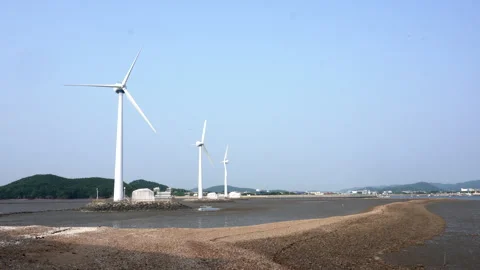 Offshore wind turbines over the sea Stock Footage 335550956
