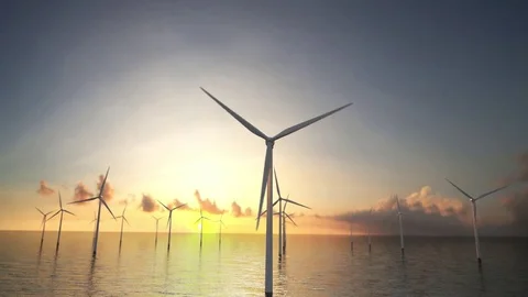 Offshore wind turbines at sunset. Wind Farm, renewable energy. ocean Stock-Footage 77500800