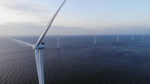 Offshore windmill park with clouds and a blue sky, windmill park in the ocean Stock Footage 155836526