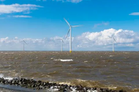 Offshore windmill park Stock Photos