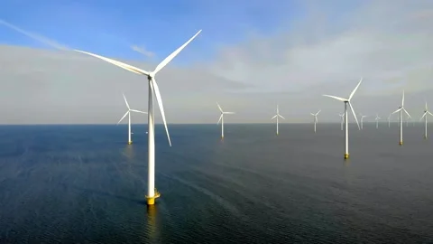 Offshore windmill park, windmill park in the ocean aerial view wind turbine Stock Footage 227628896