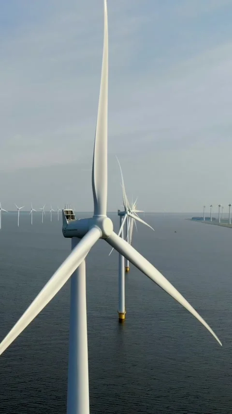 Offshore windmill park, windmill park in the ocean aerial view wind turbine Stock Footage 228194499