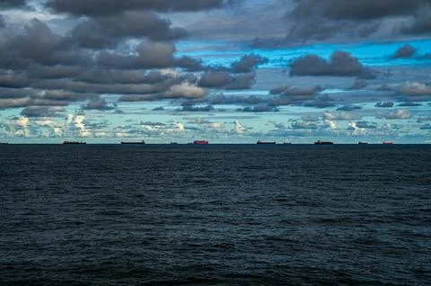 Offshore work area, ships, towers, and FPSO. Stock Photos