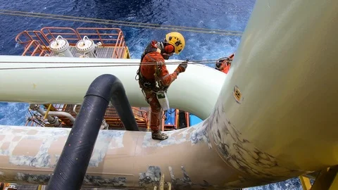Offshore workers working at height and overboard. Stock Footage 99136477