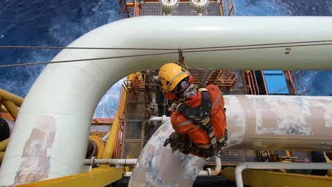 Offshore workers working at height and overboard. Stock Footage 99137094