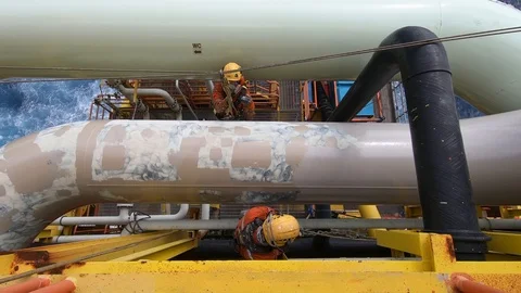 Offshore workers working at height and overboard. Stock-Footage 99137376
