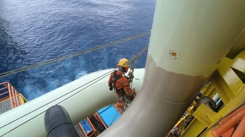 Offshore workers working at height and overboard. Stock Footage 99137748