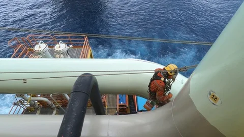 Offshore workers working at height and overboard. Stock Footage 99137922
