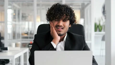 Ofiice worker indian man professional employee feel dental pain at work. Video stock 238542353