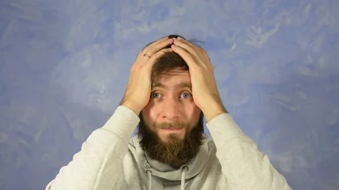 Oh God, what now to do. The emotion of shock. Stock Footage 127912077