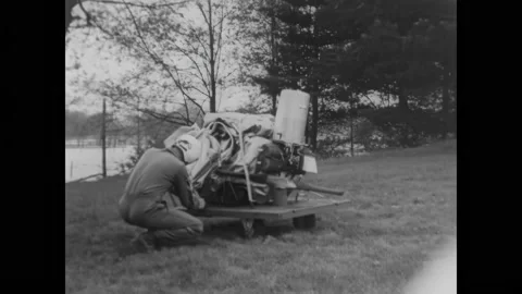 OHIO - 1958 - A US Navy pilot unloads components to assemble an inflatoplane, Video stock 313048398