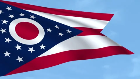 Ohio flag waving on a clear blue sky Stock Footage 323637141
