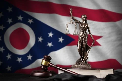 Ohio US state flag with statue of lady justice, constitution and judge hammer on Photos