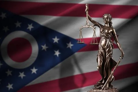 Ohio US state flag with statue of lady justice and judicial scales in dark room Photos