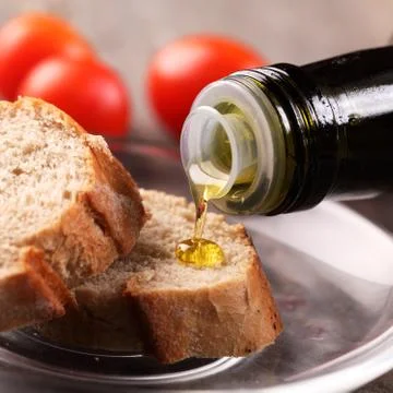 Oil and bread Stock Photos