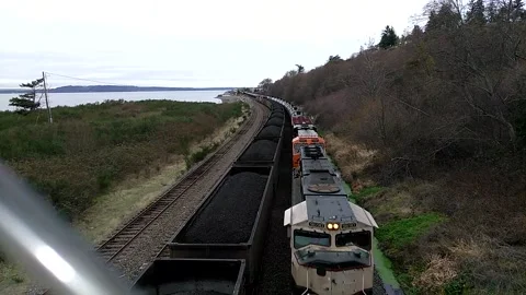 Oil and coal moving by train in the Puget Sound Stock Footage 172312423