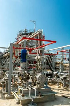 Oil and gas processing facilities and pipes Stock Photos