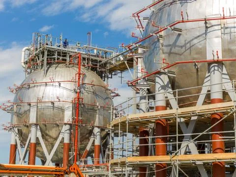 Oil and gas processing large diameter round towers _ Stock Photos