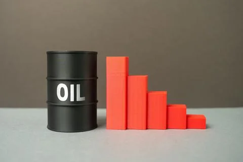 An oil barrel and a falling chart. Falling oil prices, production cuts. Conce Stock Photos
