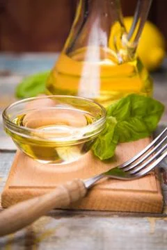 Oil with basil Stock Photos