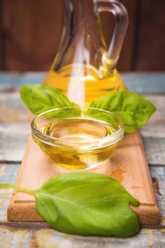 Oil with basil Stock Photos