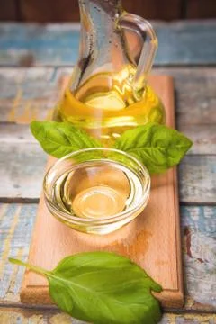 Oil with basil Stock Photos