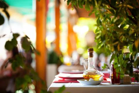 Oil bottle on a table at restaurant Stock Photos