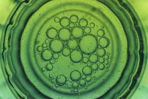 Oil bubbles green linear gradient Stock Photos