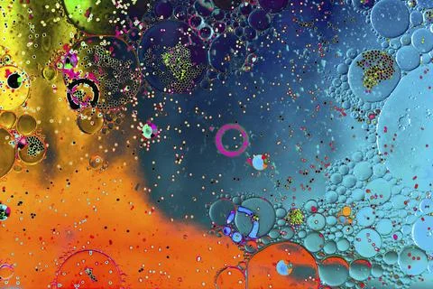 Oil bubbles inside water base form patterns Stock Illustration