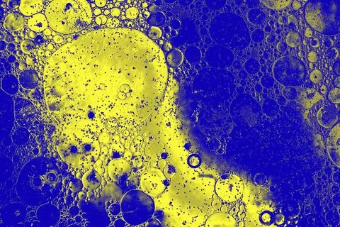 Oil bubbles inside water base form patterns Stock Illustration