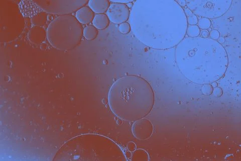 Oil bubbles inside water base form patterns Stock Illustration