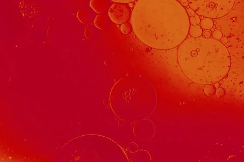 Oil bubbles inside water base form patterns Stock Illustration