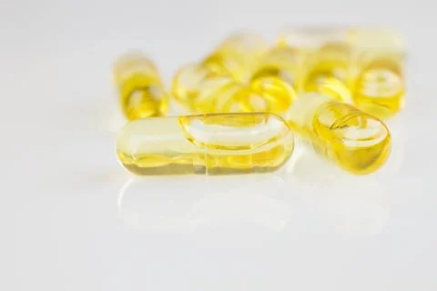 Oil capsules Stock Photos
