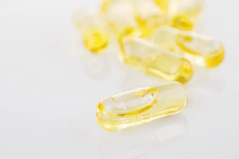 Oil capsules Stock Photos