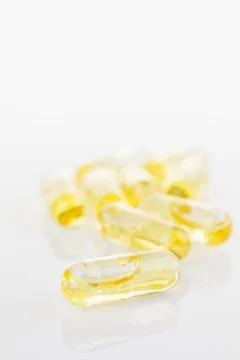 Oil capsules Stock Photos