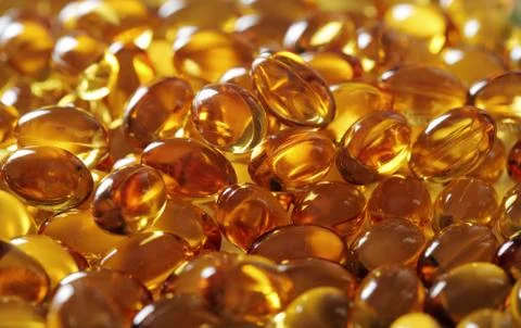 Oil capsules Stock Photos