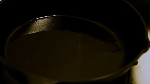 Oil in Cast Iron Stock Footage 85823442