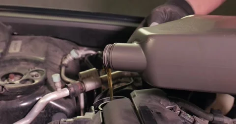 Oil change as car engine maintenance Video stock 170515478