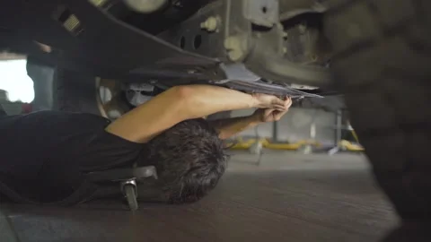An Oil Change at a Car Workshop Stock Footage 157770022