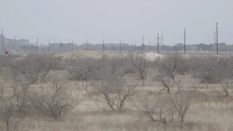 Oil derricks in Midland Stock Footage 104872740