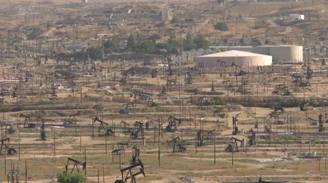 Oil Derricks pumping oil Stock Footage 8677734