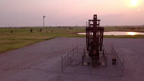 Oil derricks at sunset in Oklahoma Stock Footage 132463891