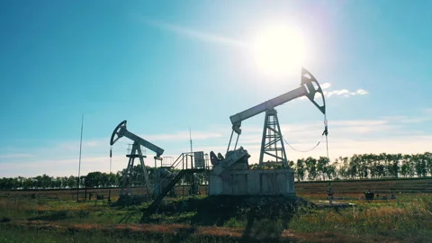 Oil development site with functioning pumping units. Oil well, crude oil Video stock 140735380