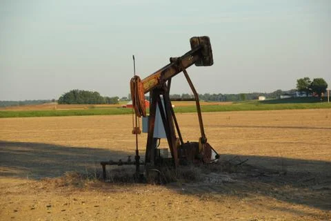 Oil drilling pump on field USA Stock Photos