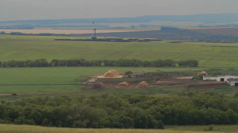 Oil drilling rig in field Stock Footage 58091726