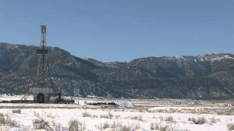 Oil drilling rig mountain close pan M HD Stock Footage 310125