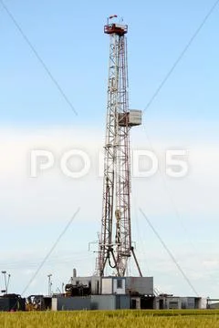 Oil drilling rig on oilfield Stock Photos